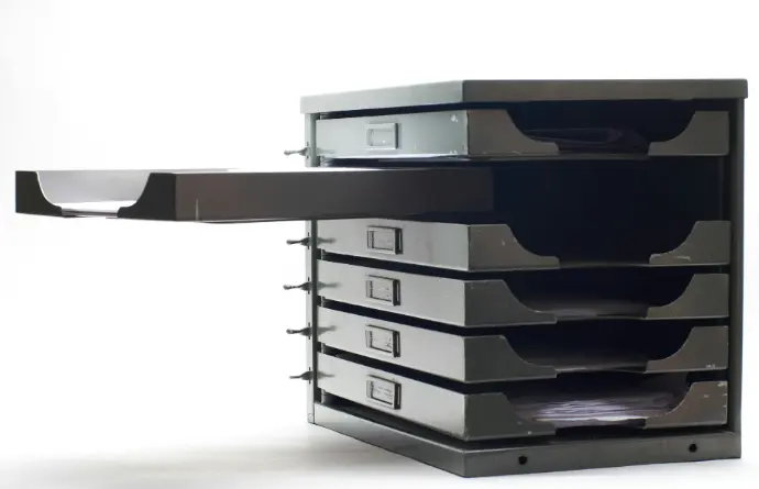 a stack of drawers sitting on top of each other